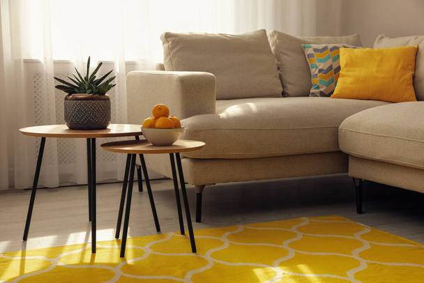 Living room interior with stylish rug and furniture, above view - Valokuva, kuva