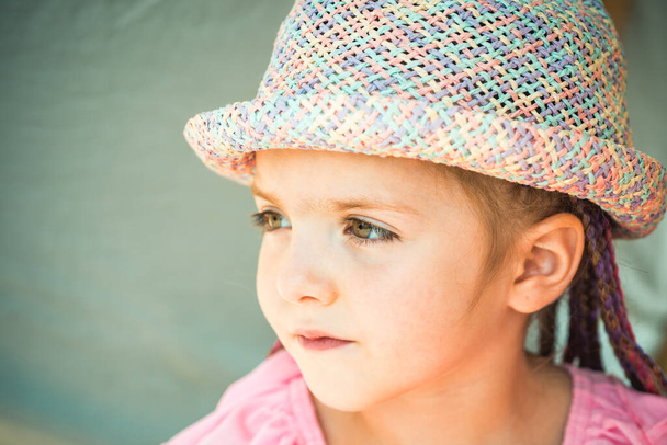 Closeup portrait girl. Child positive emotions. Summer days. Pretty kid outdoor. Happy childhood. - Foto, Bild