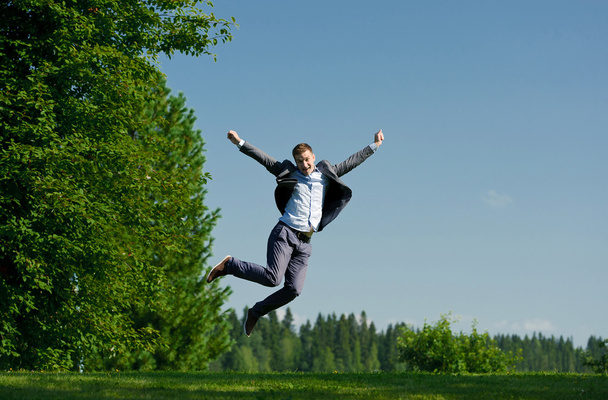 Young man jumping outside - Zdjęcie, obraz