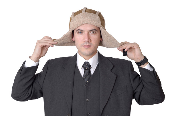 Hombre joven de negocios con un sombrero aislado en blanco
 - Foto, Imagen