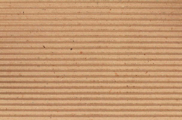 Fond de texture de feuille de carton, détail du motif de boîte en papier brun recyclé. - Photo, image