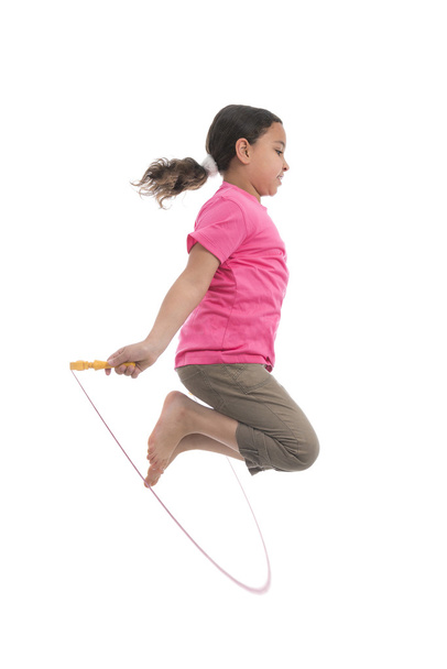 アクティブな少女スキップ ロープをジャンプ - 写真・画像