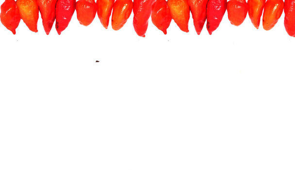 bhut jolokia ghost pepper isolated on white background. ghost pepper page border .bhut jolokia ghost pepper isolated on white background.bhut jolokia . - Valokuva, kuva