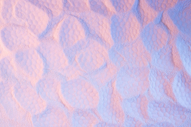 Fashion summer trendy neon pink and blue sand texture with printed cells abstract pattern as snake skin. - Fotografie, Obrázek