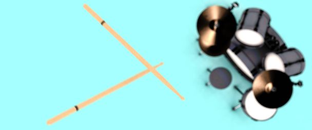 zwei Drumsticks, die über ein Schlagzeug auf hellblauem Hintergrund geworfen werden - Foto, Bild