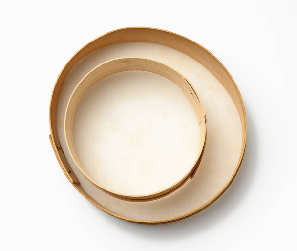 empty round wooden sieve for sifting flour on white background, top view - Zdjęcie, obraz