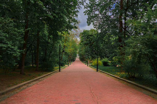 city park square pavement alley symmetry scenic landmark photography cloudy day time - Photo, Image