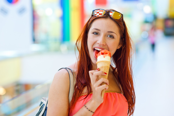 attractive woman with ice cream - Фото, зображення