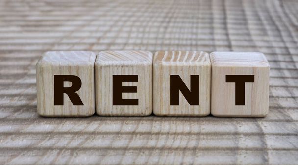 concept of the word RENT on cubes on a beautiful background. Business concept. - Foto, Imagem