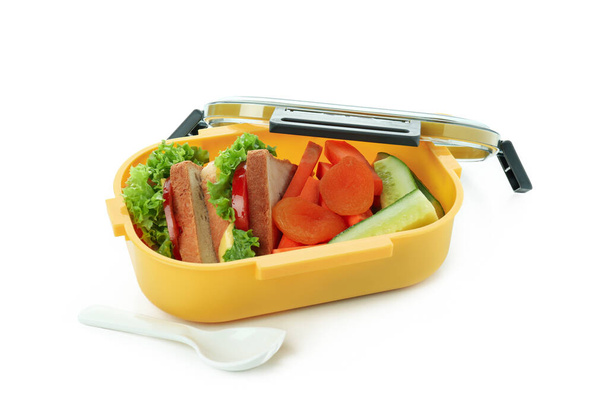 Lunchbox met lekker eten geïsoleerd op witte achtergrond - Foto, afbeelding