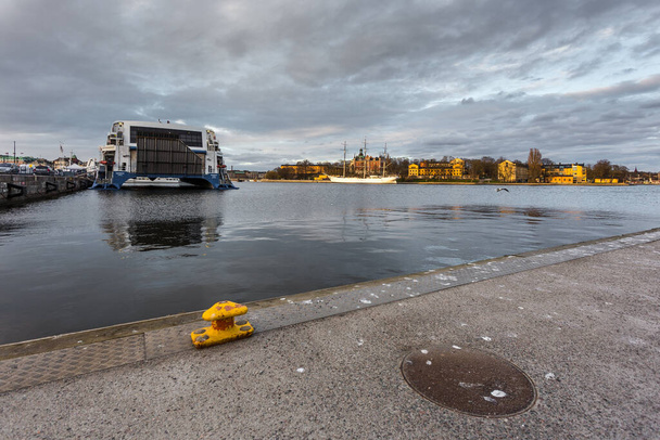 Stockholm, Sweden - 18 April 2016: Ship moored at Riddarholmen Island in Gamla Stan. Center of capital city. - Zdjęcie, obraz