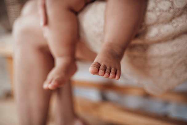 feet of cute toddler close-up view - Photo, Image