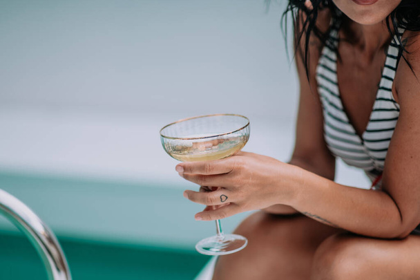 cropped image of woman holding cocktail - Photo, Image