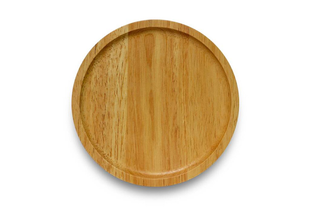 Порожня дерев'яна тарілка ізольована на білому тлі з відсічним контуром. Вид зверху на дерев'яну тарілку
. - Фото, зображення