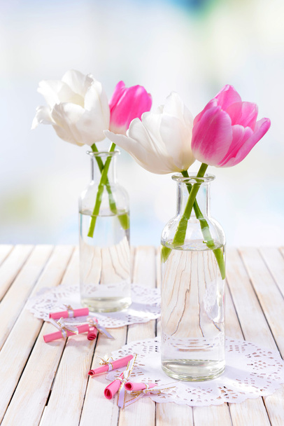 Beautiful tulips in bucket in vase on table - Foto, immagini