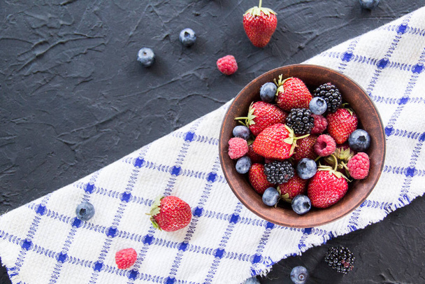 A healthy serving of fresh summer berries. Creative atmospheric decoration - Foto, Imagem