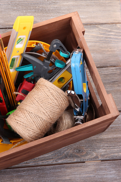 Wooden box with different tools - Fotoğraf, Görsel