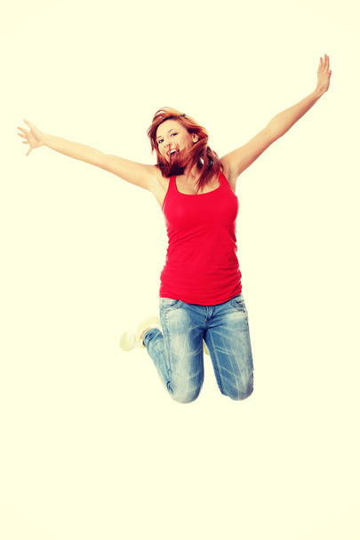 Woman jumping in the air - Photo, Image