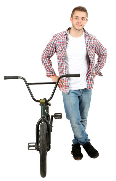 Young boy on BMX bike isolated on white - Foto, afbeelding