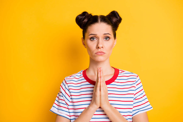 Photo of unhappy upset young lady dressed striped outfit ask forgiving her isolated yellow color background - Fotoğraf, Görsel