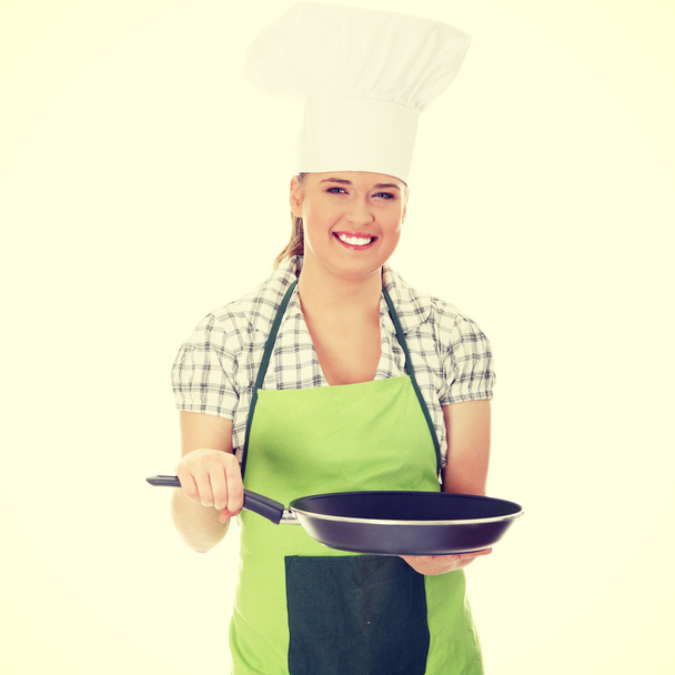 Young woman cooking healthy food - Фото, зображення