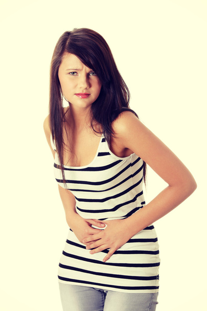 Mujer con problemas de estómago
 - Foto, Imagen