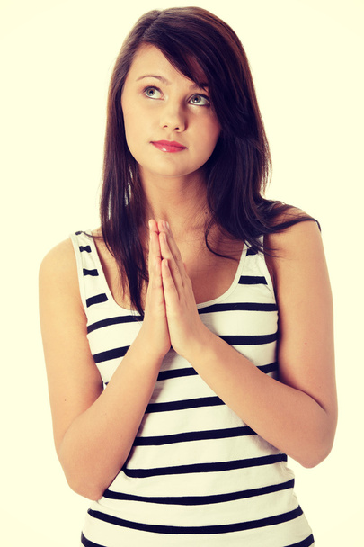 Nainen rukoilemassa - Valokuva, kuva