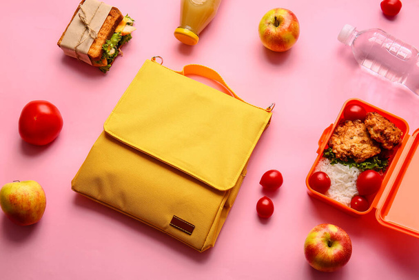 Lunch box bag and food on color background - Photo, Image