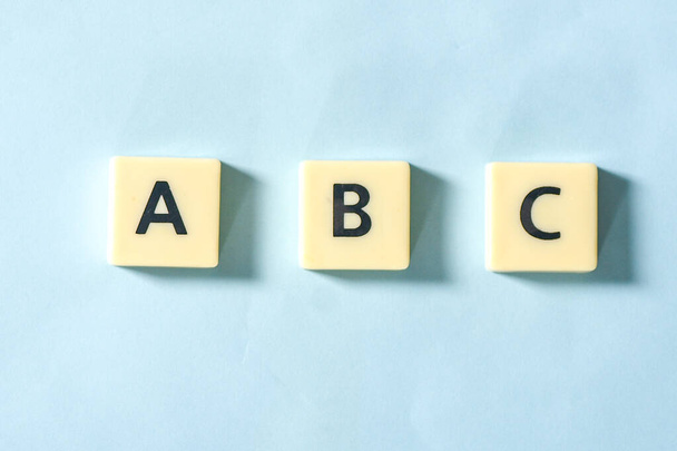ABC alphabet on blue background - Фото, зображення
