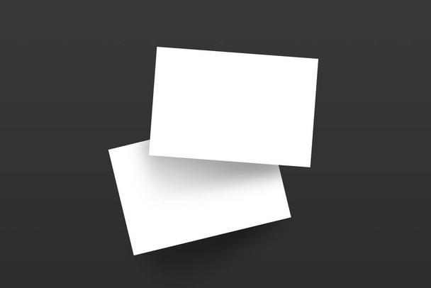 Dos identidades de marca en blanco, tarjetas de visita maqueta de diseño de plantilla sobre fondo gris oscuro. Piso tendido, vista superior. - Foto, imagen