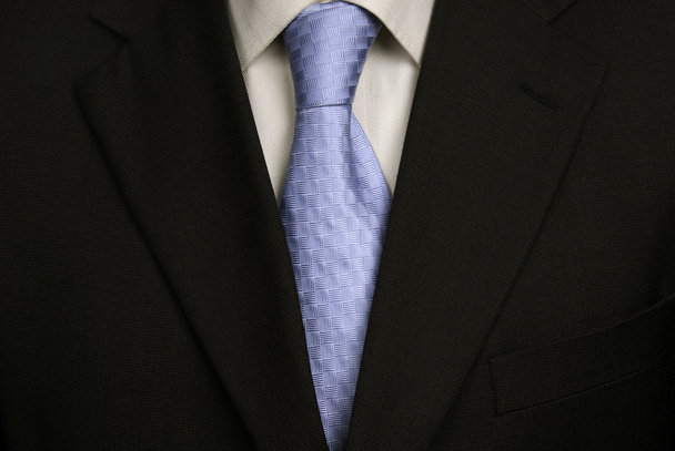 Detail eines Geschäftsmannanzugs mit blauer Krawatte - Foto, Bild