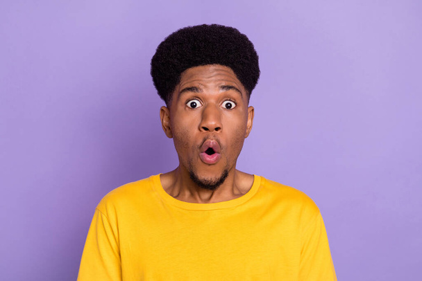 Portrait of attractive confused amazed guy sudden news reaction pout lips isolated over violet purple color background - Photo, Image