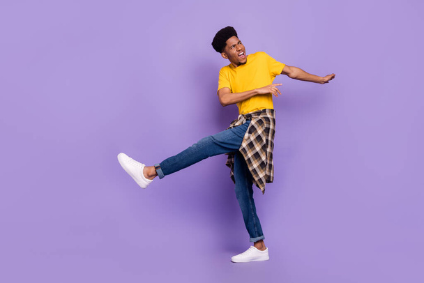 Full length body size view of attractive cool funky guy dancing having fun good mood rest isolated over violet purple color background - Zdjęcie, obraz