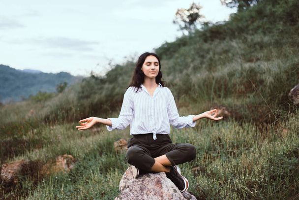 Portrait of young beautiful woman practice doing yoga at outdoor - Φωτογραφία, εικόνα
