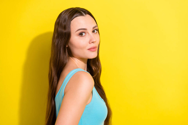 Photo portrait girl with long hair wearing casual clothes isolated vivid yellow color background - Fotografie, Obrázek