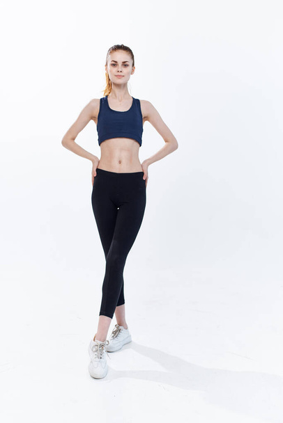 woman in sportswear posing in  gym. High quality photo - Zdjęcie, obraz