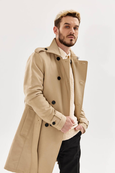 man fashion hairstyle coat modern style isolated background - Photo, image