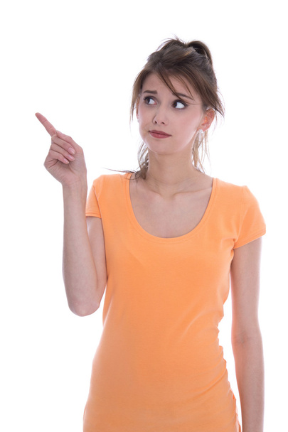 Portrait of an anxious isolated young girl in orange pointing wi - Φωτογραφία, εικόνα
