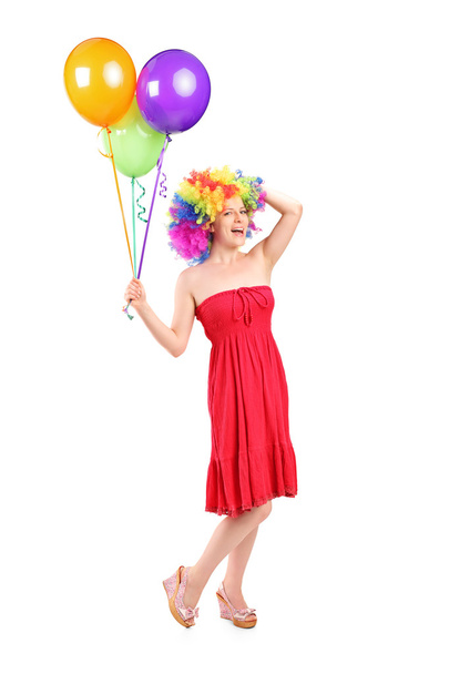 Woman with wig holding balloons - Fotografie, Obrázek