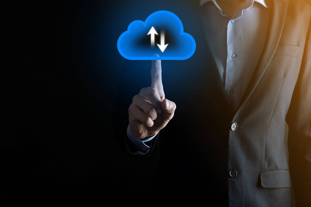 Businessman hold cloud icon.Cloud computing concept - connect smart phone to cloud. computing network information technologist with smart phone.Big data Concept - Фото, изображение