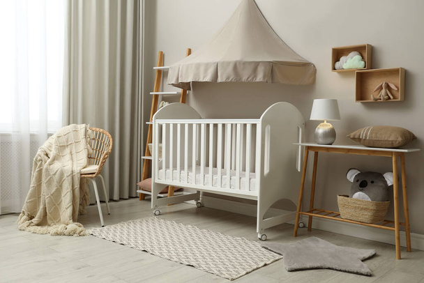 Modern baby room interior with stylish crib - Zdjęcie, obraz