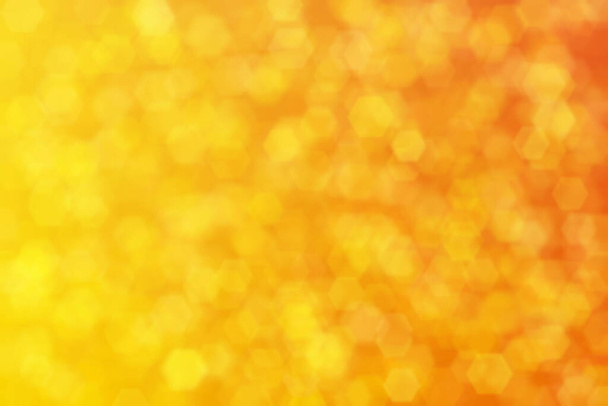 orange et jaune abstrait fond déconcentré avec des taches bokeh forme hexagonale - Photo, image