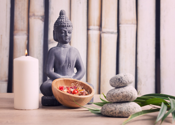 Wellness and spa concept with buddha figure - 写真・画像