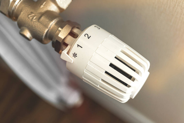Heating radiator thermostat indoors close-up photo - Photo, Image