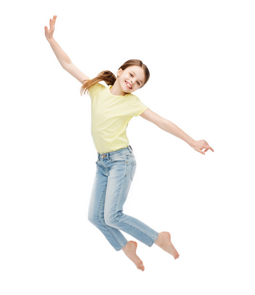 smiling little girl jumping - Fotografie, Obrázek