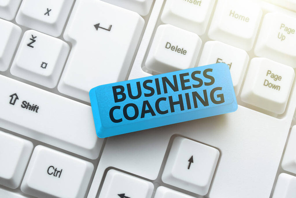 Text caption presenting Business Coaching. Internet Concept providing support and occasional advice to an individual Writing Comments On A Social Media Post, Typing Interesting New Article - Foto, immagini