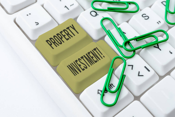 Text caption presenting Property Investment. Concept meaning Asset purchased and held primarily for its future income Typist Creating Company Documents, Abstract Speed Typing Ideas - Zdjęcie, obraz