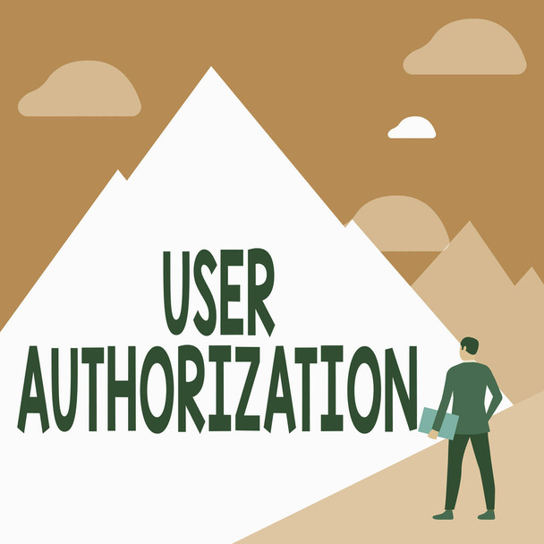 Text sign showing User Authorization. Concept meaning security mechanism to determine access levels or user Gentleman In Suit Standing Holding Notebook Facing Tall Mountain Range. - Foto, Imagem