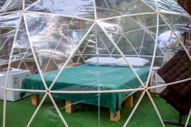 Transparent bell tent in forest, glamping, luxury travel, glamourous camping, lifestyle outdoor - Photo, Image