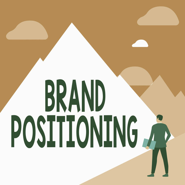 Conceptual caption Brand Positioning. Business idea creating a unique impression in the minds of the customers Gentleman In Suit Standing Holding Notebook Facing Tall Mountain Range. - Photo, Image